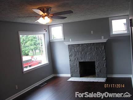 Family room
						:
						Family room with wood burning fireplace. Can be converted into gas.