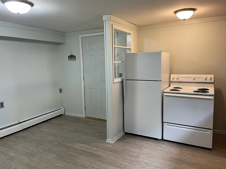 Kitchen and entrance to unit