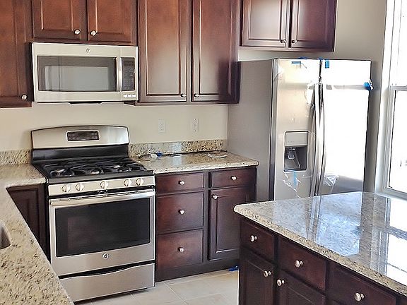 Kitchen with SS Appliances
