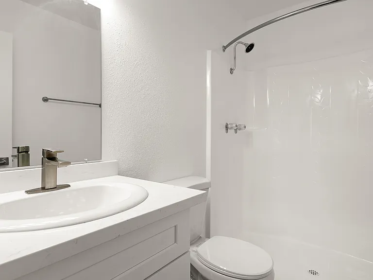 Bright and thoughtfully-designed bathrooms made for daily ease.