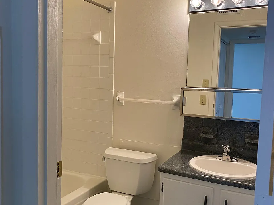 Updated countertops, tub and tile. Beautiful new floor.
