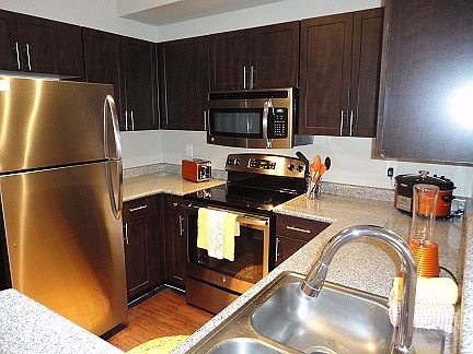 Kitchen with Stainless Steel/Black Appliances