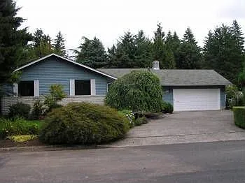 2107 NE Village Green Dr photo 1