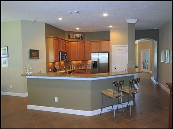 Looking into the kitchen showing the breakfast bar.
