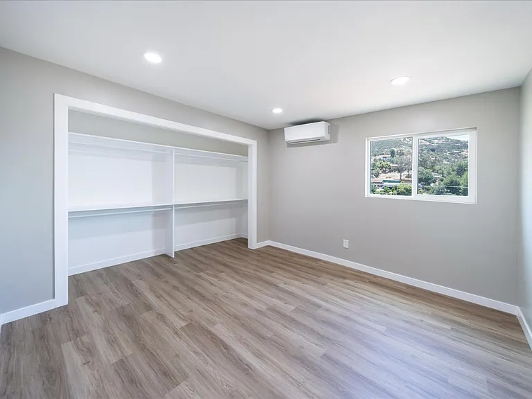 bedroom, closet doors and blinds are on order