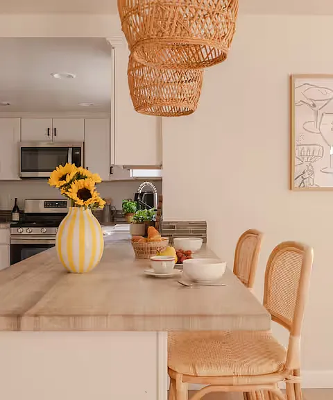 Bright and modern, this fully stocked kitchen features stainless steel appliances, spacious counters, and everything needed for easy meals.