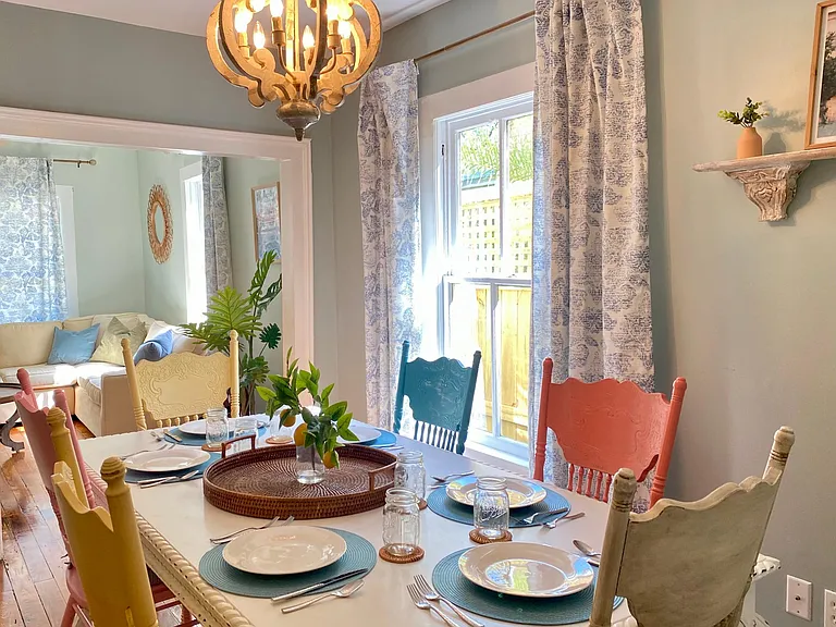 1 of 2 dining areas. Antique chairs and table have been refinished for this formal area.