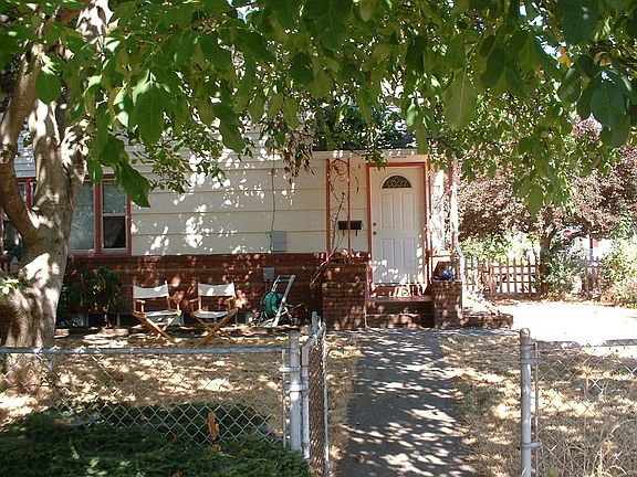 View of front yard under walnut tree