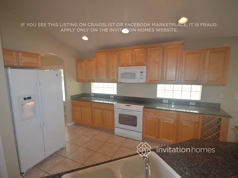 4704 Whispering Wind Ave — Photo 8
