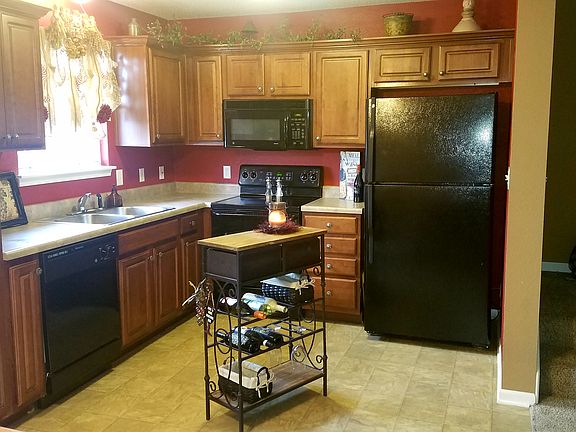 Dark cherry cabinets