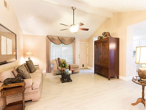 As you enter the home an elegant living room welcomes you.