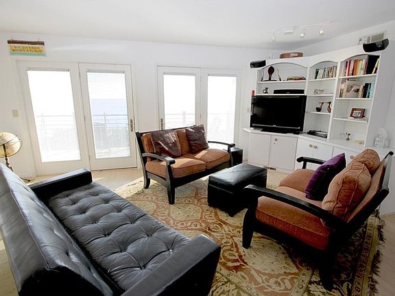 Living Area with great bayviews, opens to deck