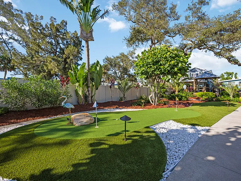 CUSTOM BUILT PRO PUTTING GREENS DIRECTLY ON THE BAY