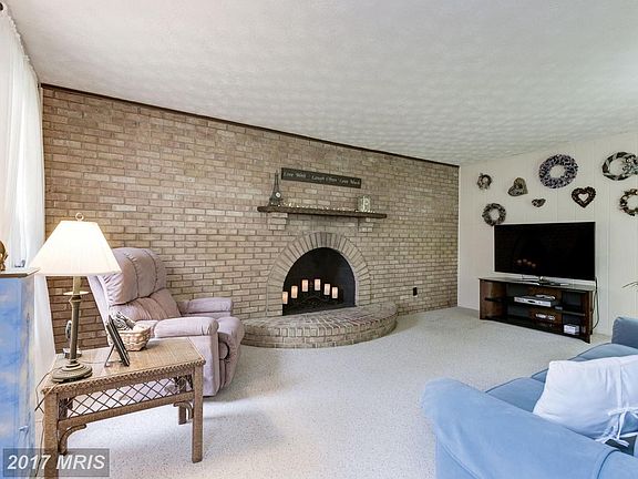 Brick Accent Wall w/Cozy Wood Burning Fireplace