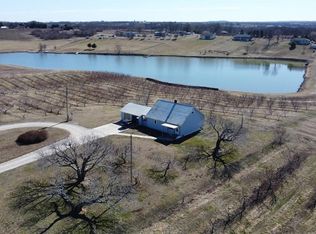 8676 Appletree Ln, Lexington, MO 64067