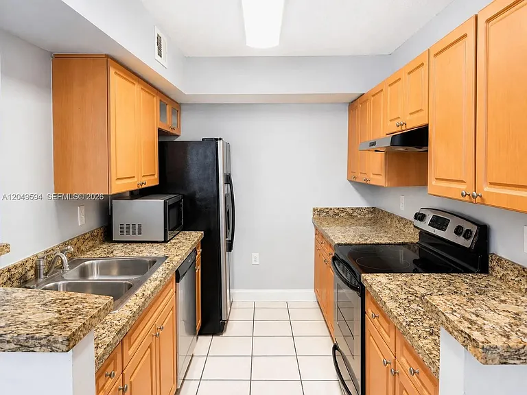 15560 SW 104th Ter #611 — Photo 7