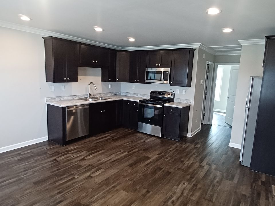Open kitchen, dining, and living area