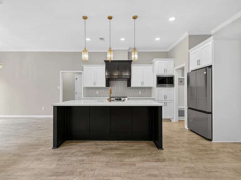 Kitchen is equipped with all stainless appliances.