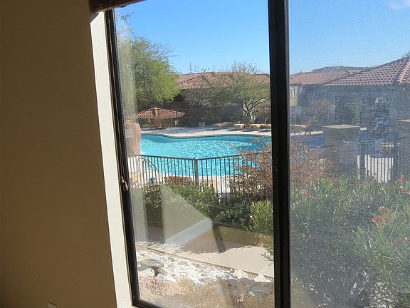 Bedroom with pool view