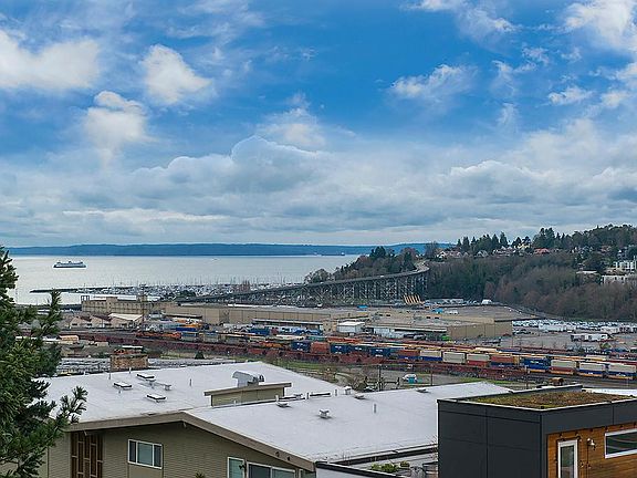 Watch the ferries cross Elliott Bay from your balcony.