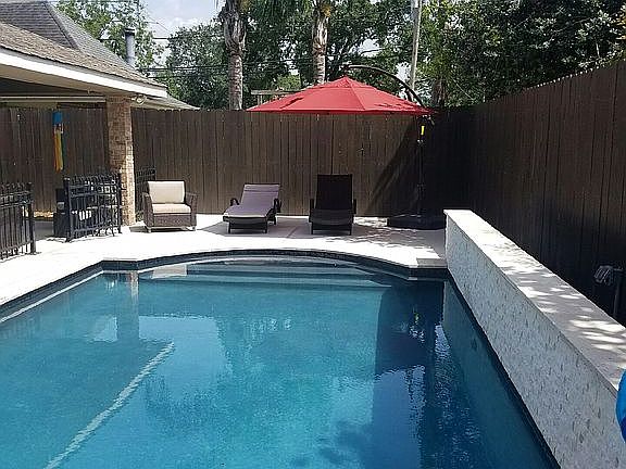 Remodeled pool with waterfal