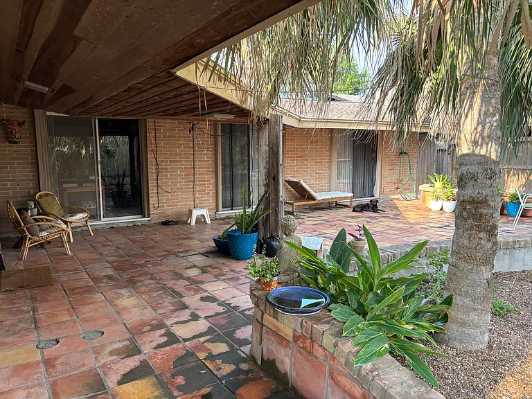 Patio outside three bedrooms