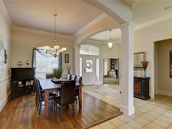 Formal or Casual Dining Room with Handscraped Hardwoods, & Crown Molding