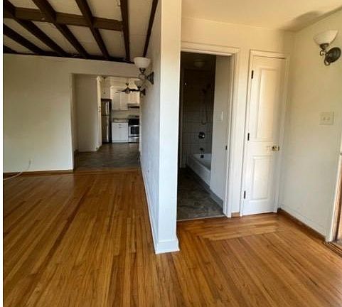 Shows living room bath and kitchen