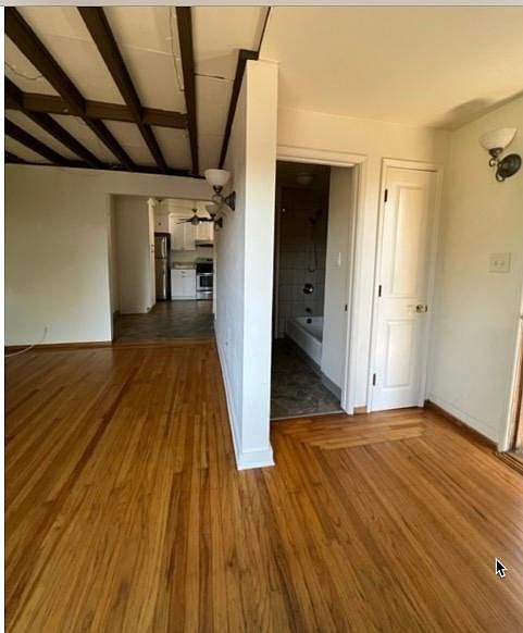 Shows living room bath and kitchen