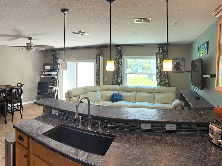 View of living room area from kitchen