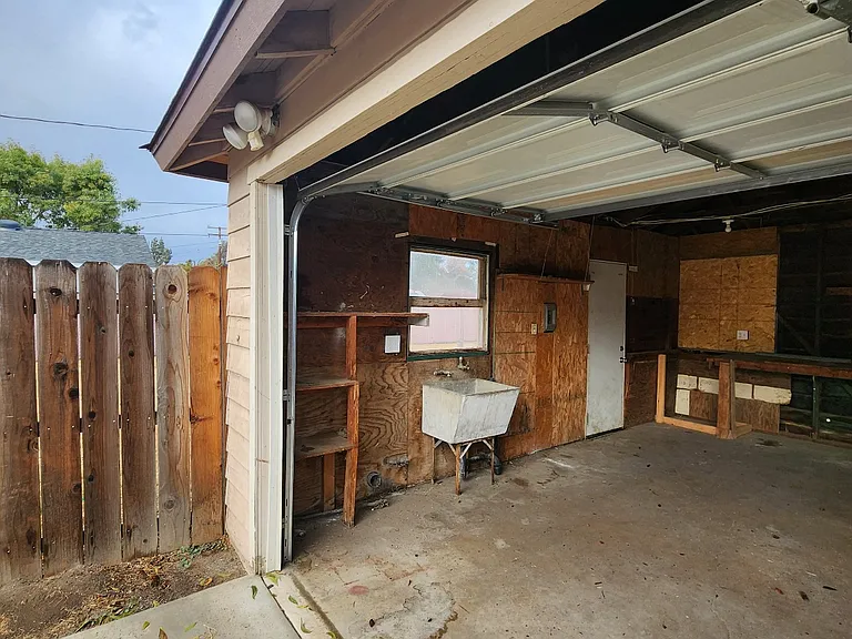 2 car garage with laundry hookups and utility sink.