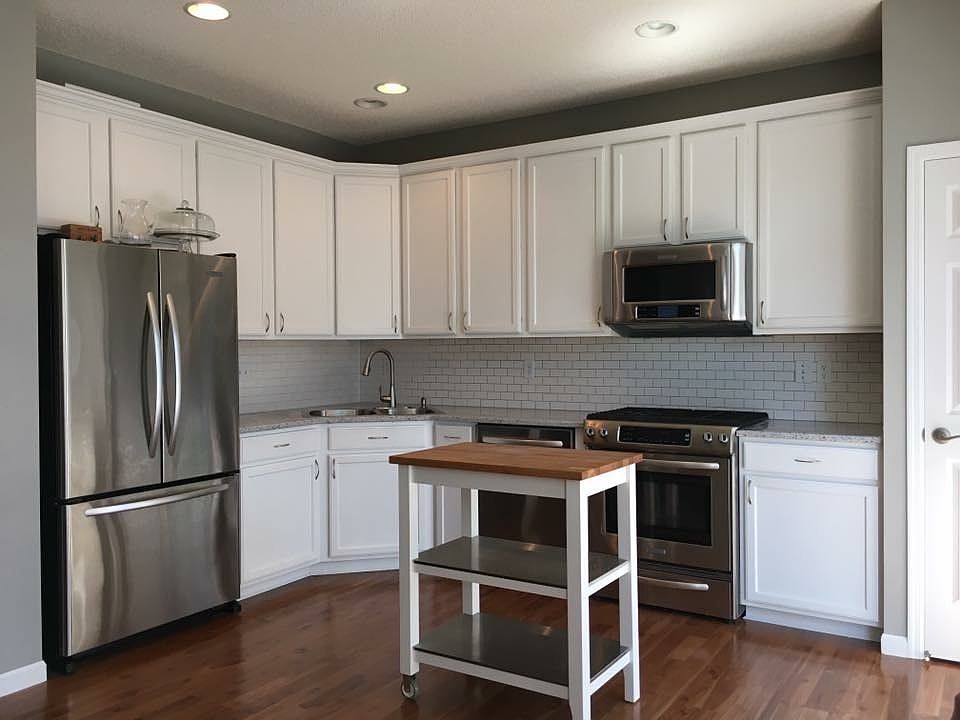 Kitchen updated with quartz countertop, subway tiles and Kit