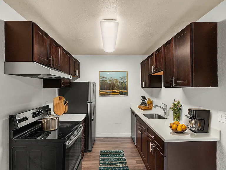 Step into this chic kitchen, where modern style meets functionality.
