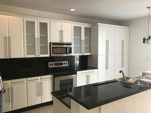Kitchen with new cabinets, stainless steel appliances, and wine cooler