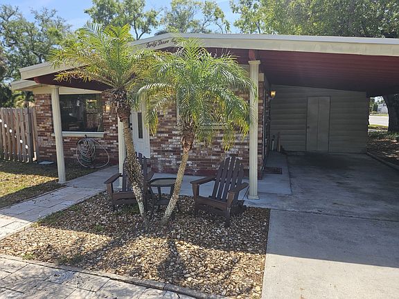Car port with utility closet