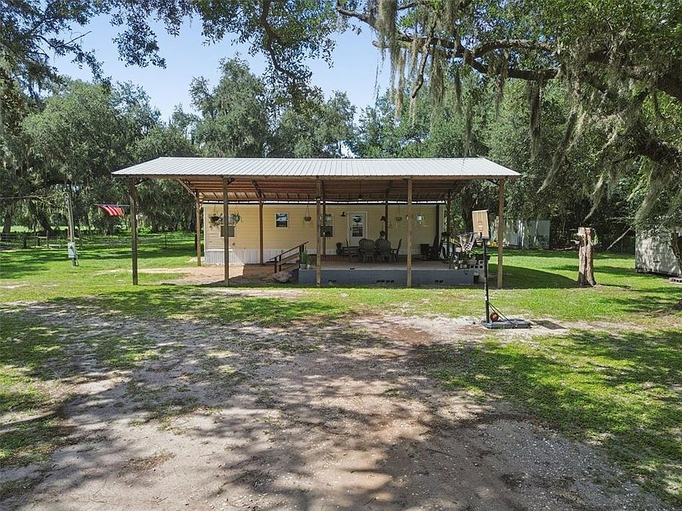 1st image of 4920 W KNIGHTS GRIFFIN ROAD