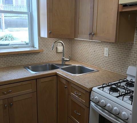 Tiled back splash, full size window