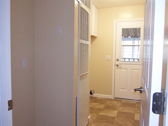 Laundry rm and door to carport