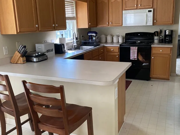 This is an old photo before the cabinets were painted.
