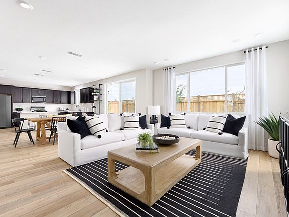 Open concept living, dining and kitchen