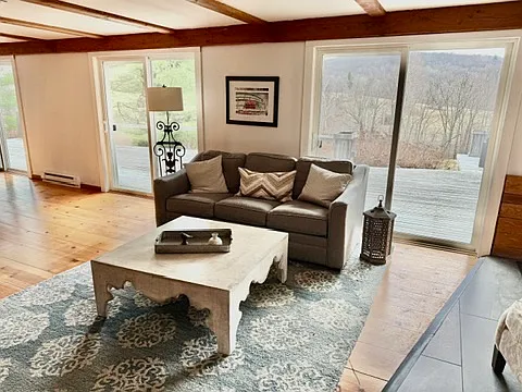 TV with foldable couch in the lower level