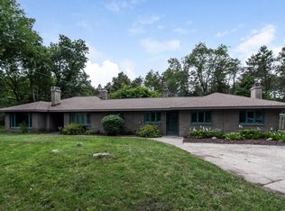 831 Honey Creek Ave NE, Ada, MI 49301