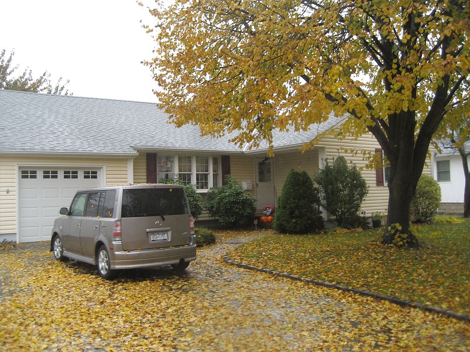 Double wide driveway with Belguim block, new garage door, and siding