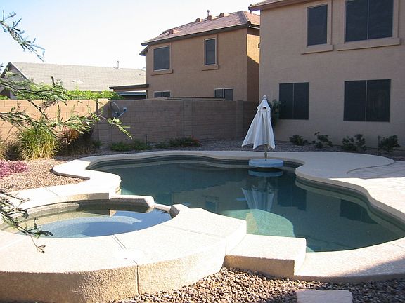 Heated pool/spa with over flow