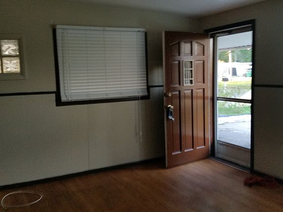 living room, wood like vinyl floors.