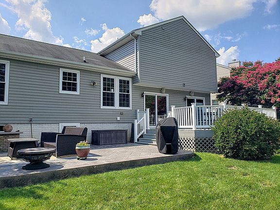 Fenced yard w/ patio & deck
