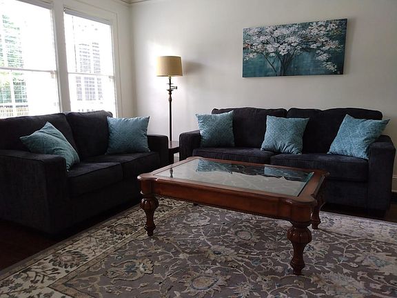 Living room sofa, loveseat and coffee table.