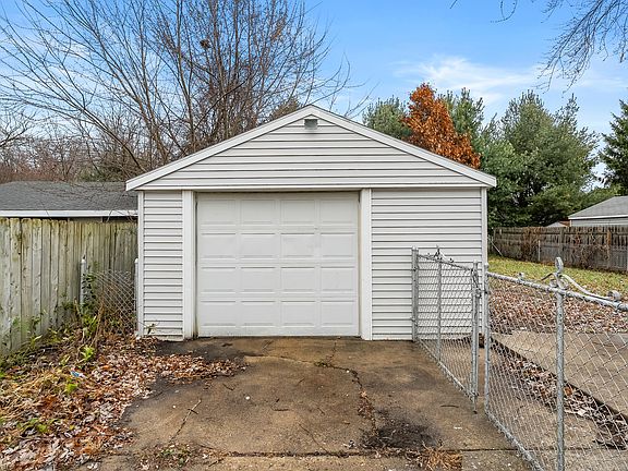 One-car garage providing convenient parking and extra storage space