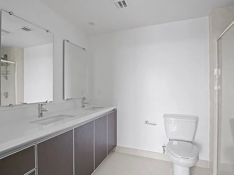 Bathroom with Walk-In Shower & Glass Door, and Vanity Cabinet Storage