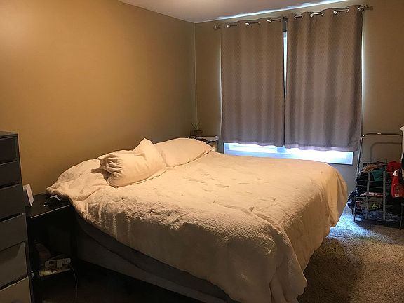 Master bedroom w/ king bed